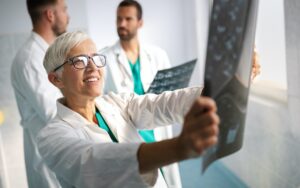 Group of doctors checking x-rays in a hospital